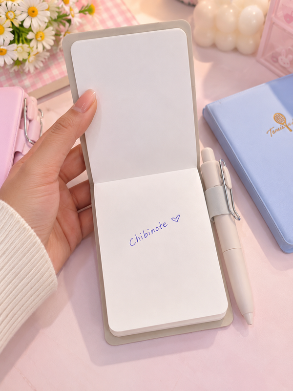 Pretty pastel note with pen