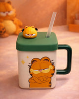 Garfield ceramic mug with straw and lid